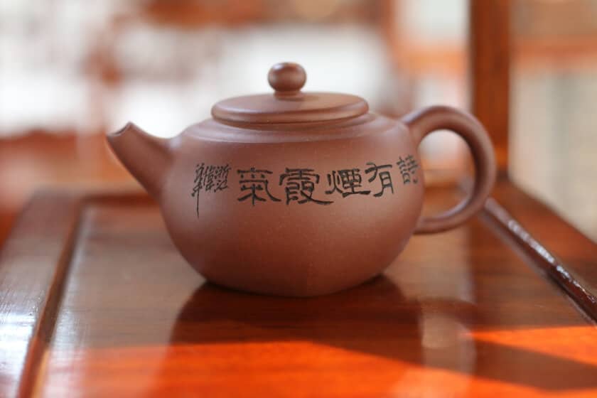 A Yixing clay teapot: a specialized tea accessory made using clay from the Chinese Yixing region.