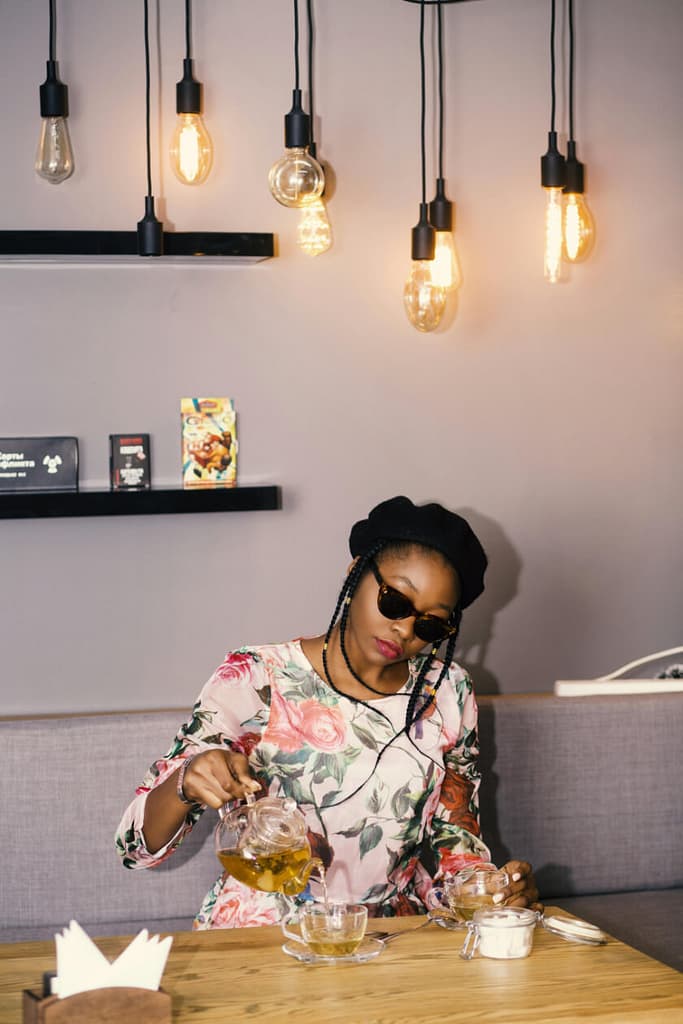 girl pouring tea