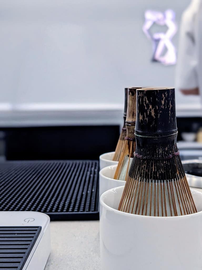 matcha whisks and bowls with Niko Neko logo in background